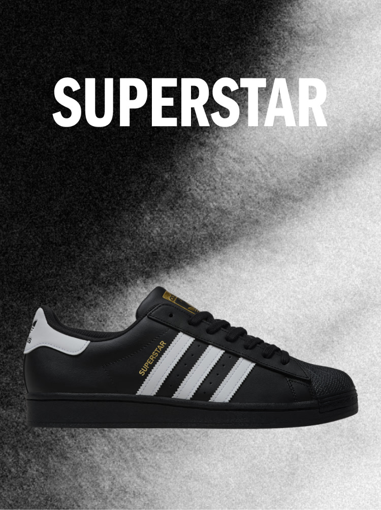 Black Adidas Superstar sneaker with white stripes on a dark background, with the word SUPERSTAR above.