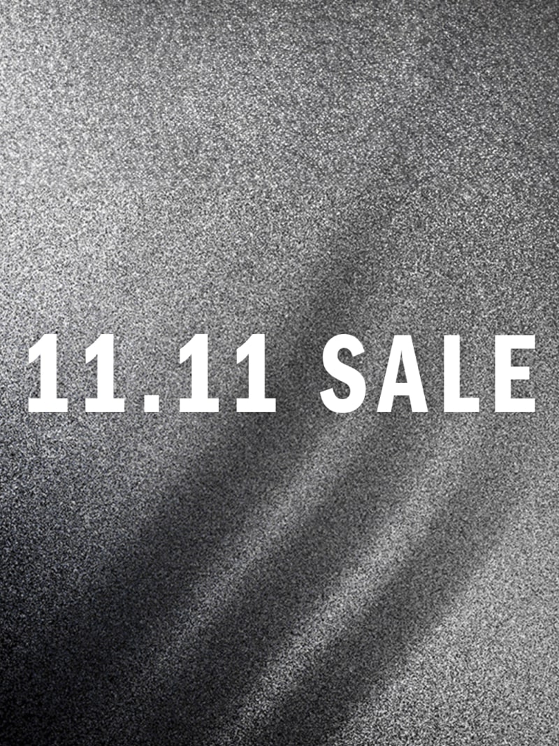 The image displays the text "11.11 SALE" prominently against a grainy, textured background, suggesting a promotional or advertising context.