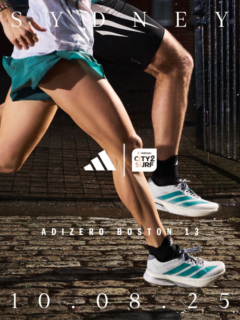The image shows a person's lower body wearing athletic clothing and shoes, standing on a wooden surface with the "Sydney" and "Adizero Boston 13" text visible.