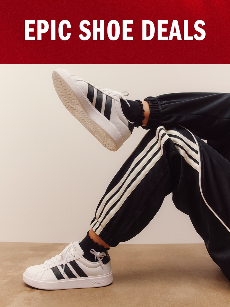 The image shows a pair of white and black sneakers with the text "EPIC SHOE DEALS" displayed prominently in the background.