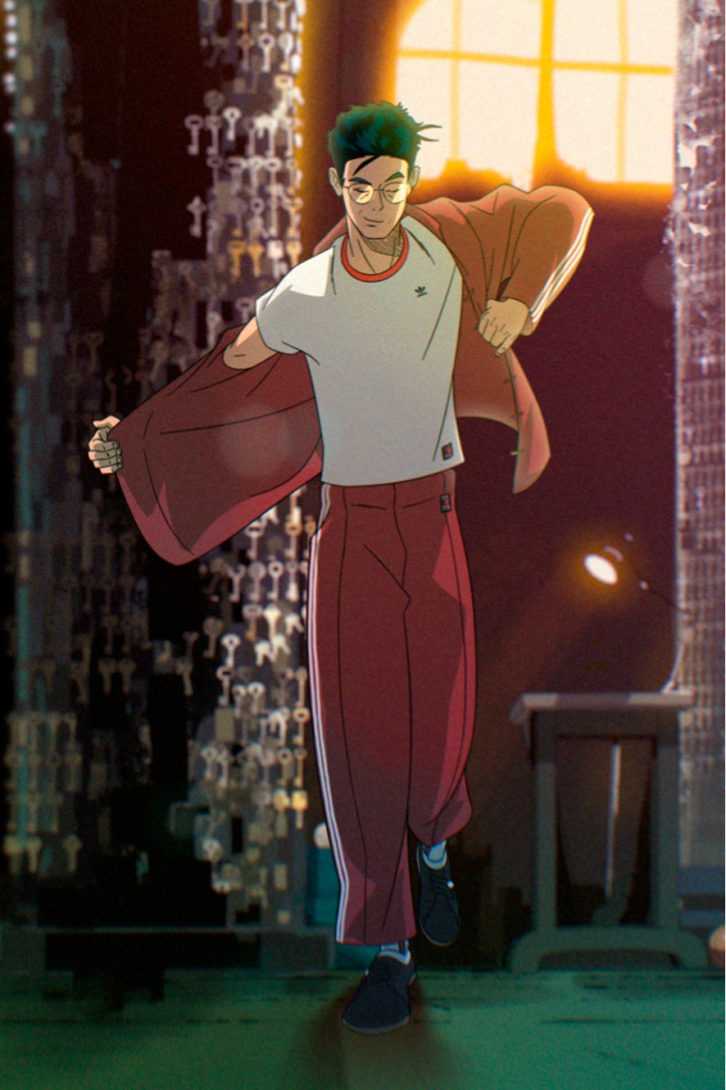 A young man in casual clothing is walking down a dimly lit city street, carrying a large red bag or suitcase.