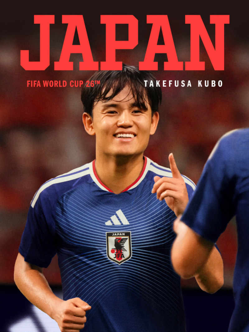 The image shows a smiling Japanese soccer player wearing a blue and white jersey, standing on a soccer field with a red "JAPAN" text in the background.