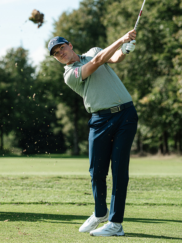 Man on golf course.