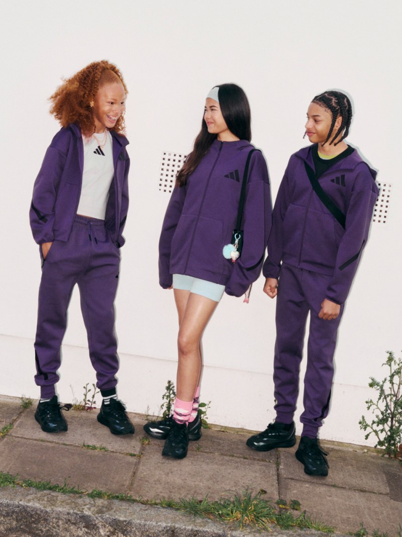 A shot of three kids hanging out on an urban street wearing various from the new ADIDAS Z.N.E.