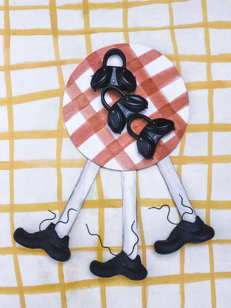 The image shows a red and white checkered plate with a group of black licorice candies arranged on it, set against a yellow and white grid-patterned background.