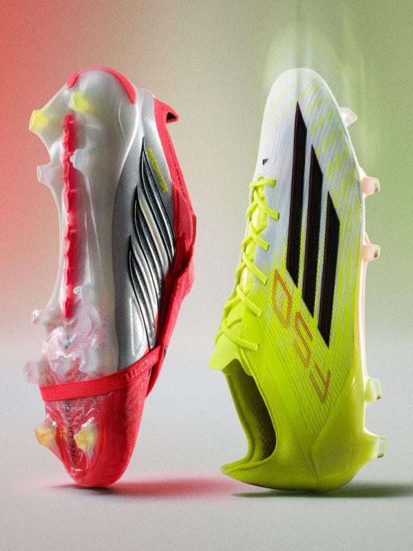 Two colorful and stylized soccer cleats, one in a bright red and white color scheme and the other in a vibrant neon yellow and black design, are the focal point of the image against a soft, blurred background.