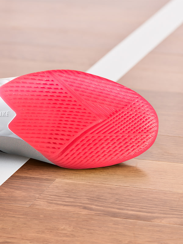 An outsole of an adidas football boot made to be played indoors