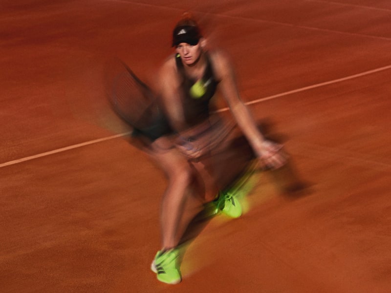 Blurred photo of a tennis player