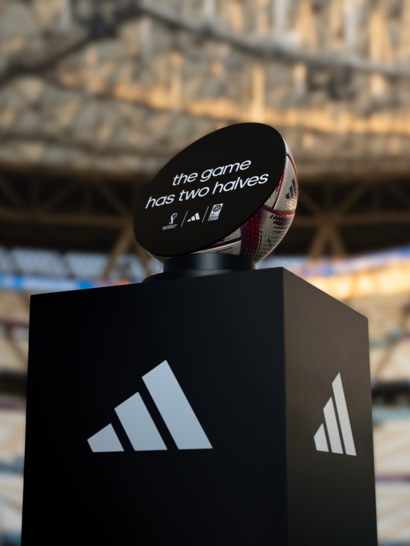 A podium with a half of the football ball on it