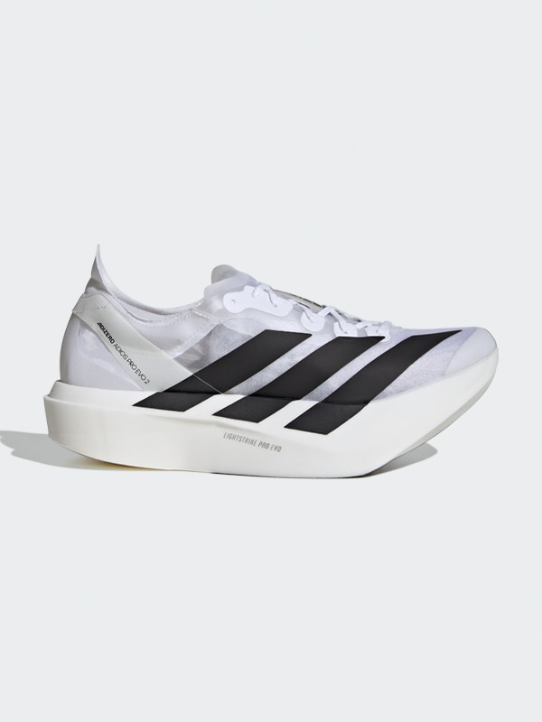 A pair of white and black athletic shoes with a sleek, modern design against a plain white background.