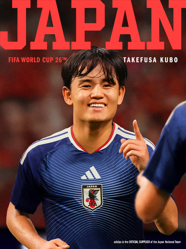 The image shows a smiling Japanese soccer player in a blue jersey with the word "Japan" prominently displayed, standing in front of a red background.