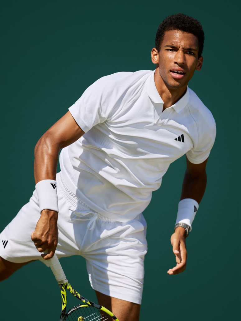 Felix Auger Aliassime playing tennis in the adidas London Collection.