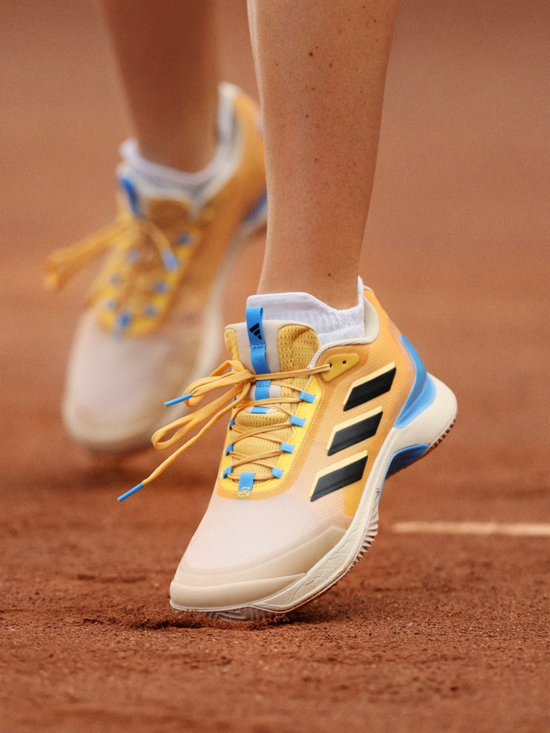 Focus on the Avacourt female-first tennis shoes.