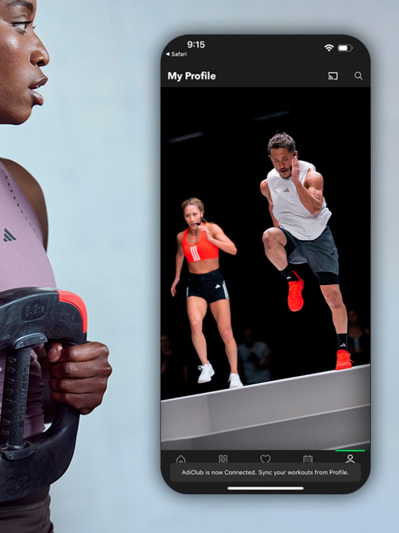 The image shows a smartphone screen displaying a profile page with a photo of two people engaged in a physical activity, likely a workout or exercise routine, against a dark background.