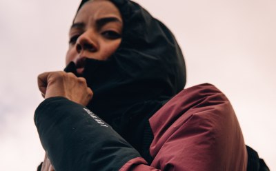 Female wears pieces from the Terrex Adventure Wardrobe FW24 Collection