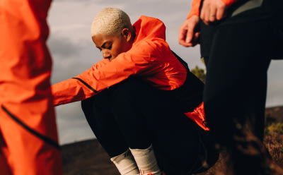 Female wears pieces from the Terrex Adventure Wardrobe FW24 Collection