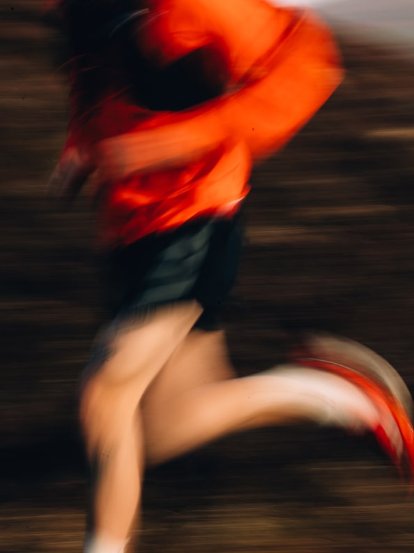 Image of a runner in the Terrex Agravic 3 and other pieces from the Terrex Adventure Wardrobe FW24 collection