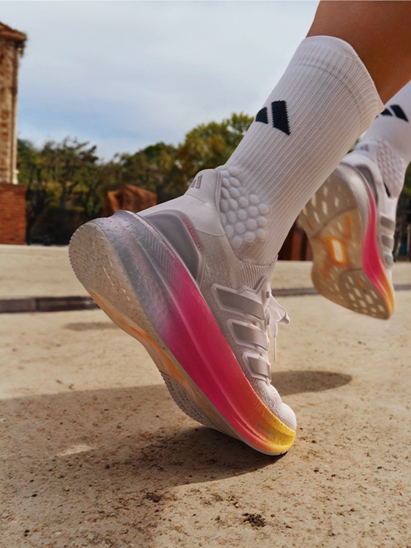 Close-up image of leg running in Ultraboost 5.