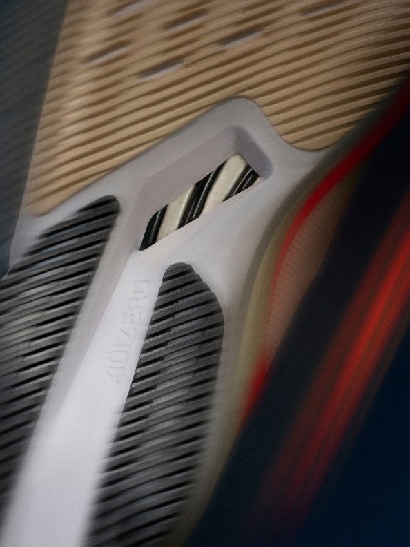 A close range detailed shot of the new Adizero Boston 12, showing the texture of the shoe.