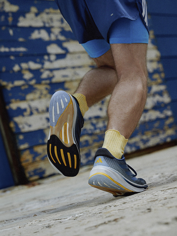 Close-up image of a man running in Supernovas.