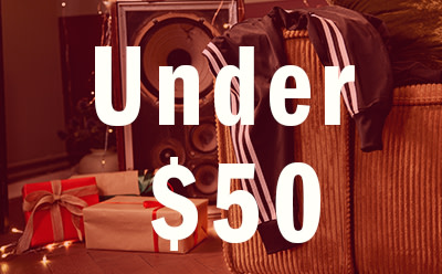 The image shows a sign that says "Under $50" with gift boxes in the background, suggesting a sale or promotion for items priced under $50.