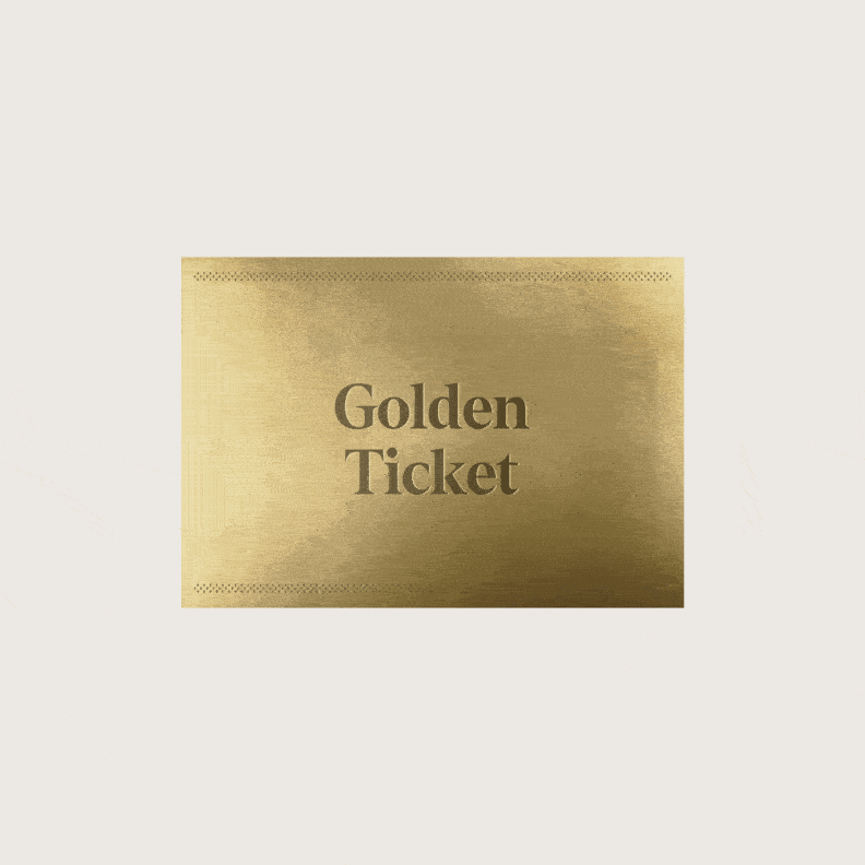 A golden-colored rectangular ticket with the text "Golden Ticket" printed on it against a plain, light-colored background.