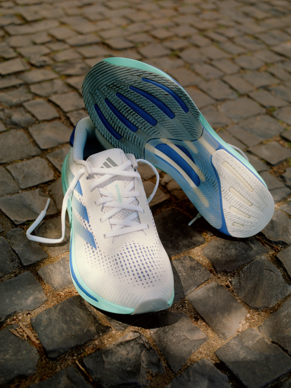 A close-up of a pair of Supernova running shoes.