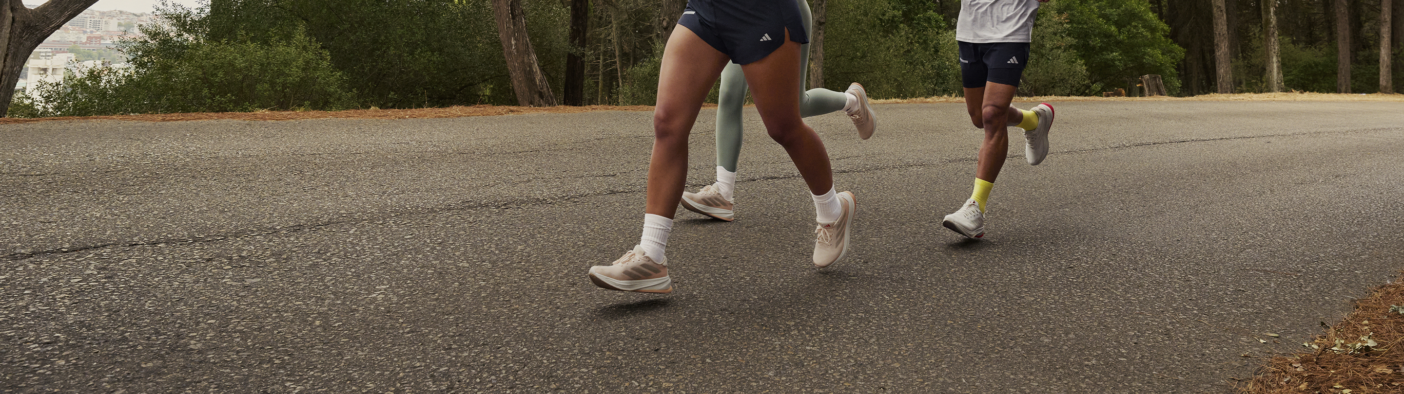 Image of two women and a man running outside in Supernova Rise 2