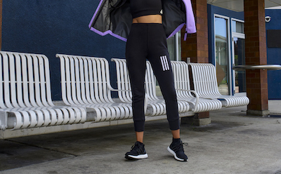 Female wearing an adidas Sportswear leggings