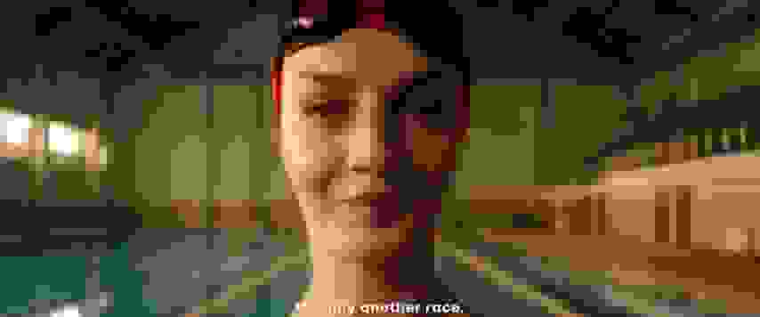 Paralympian Sümeyye Boyacı swimming underwater.