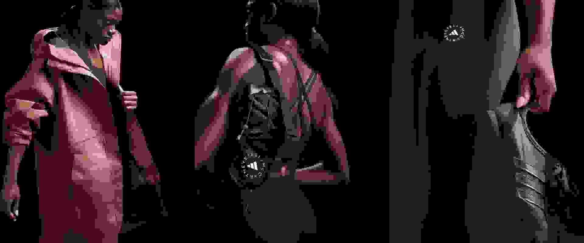 Das Bild zeigt zwei Personen, eine mit rotem und die andere mit schwarzem Kleidungsstück, die in einer schwach beleuchteten Umgebung stehen.