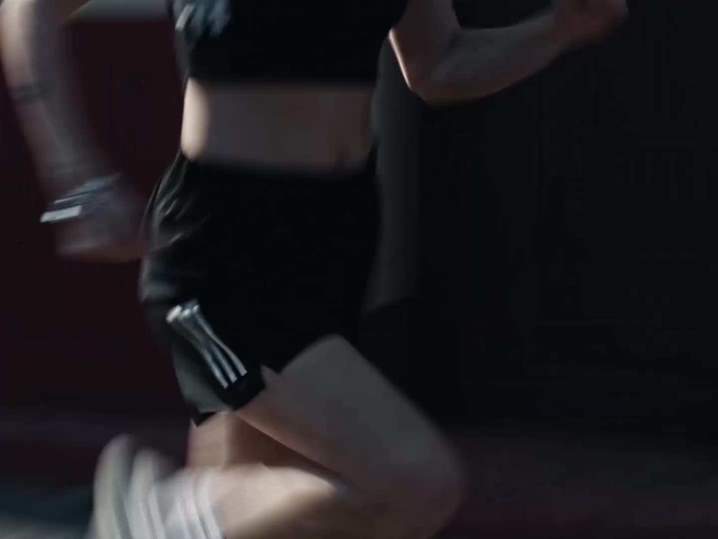 Video of a man and woman wearing Adizero Evo SL: running through the city and riding a motorbike