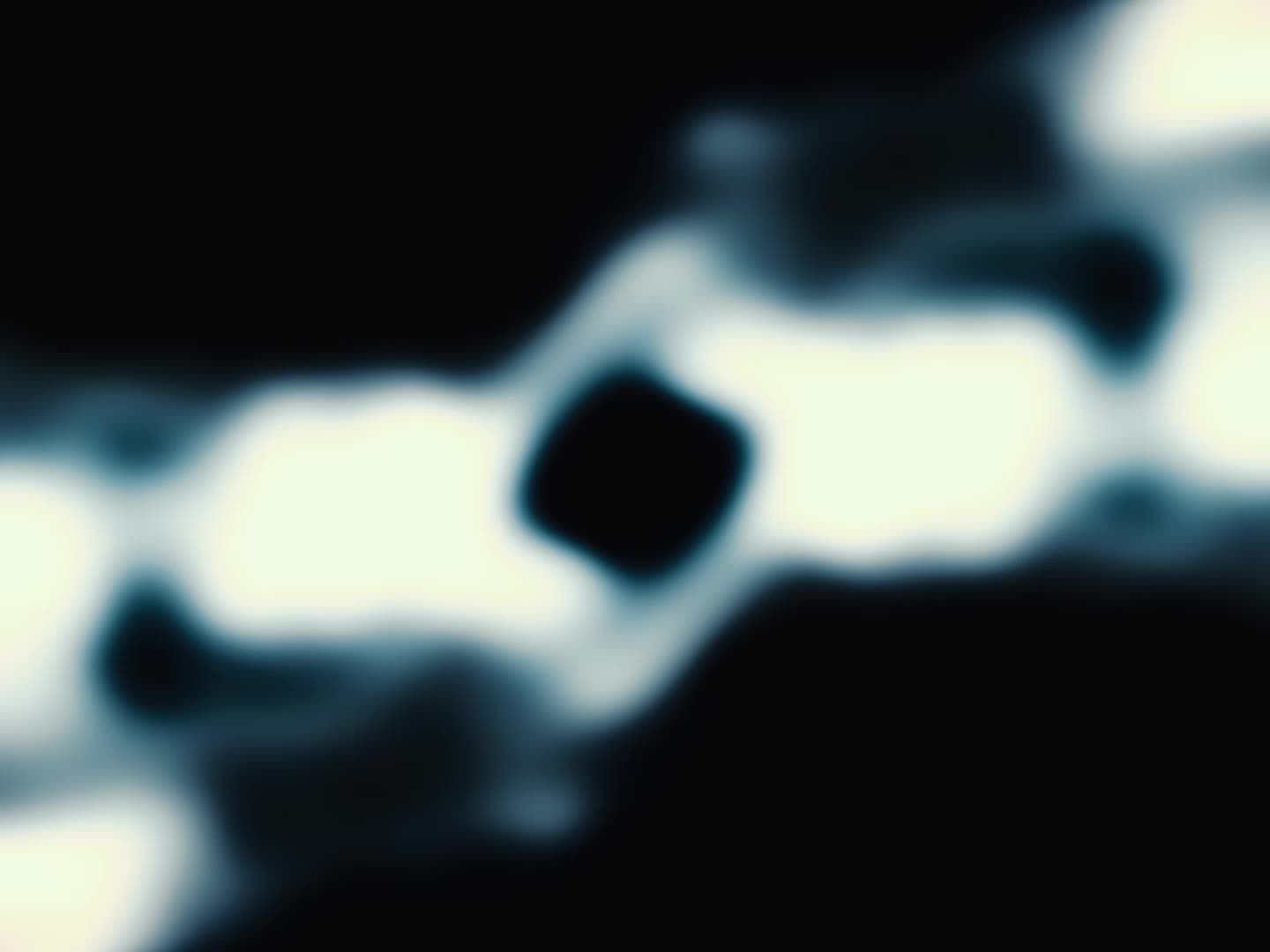 The image shows a close-up view of a person's eyes, with the eyelids partially obscured by a white, textured fabric or material.