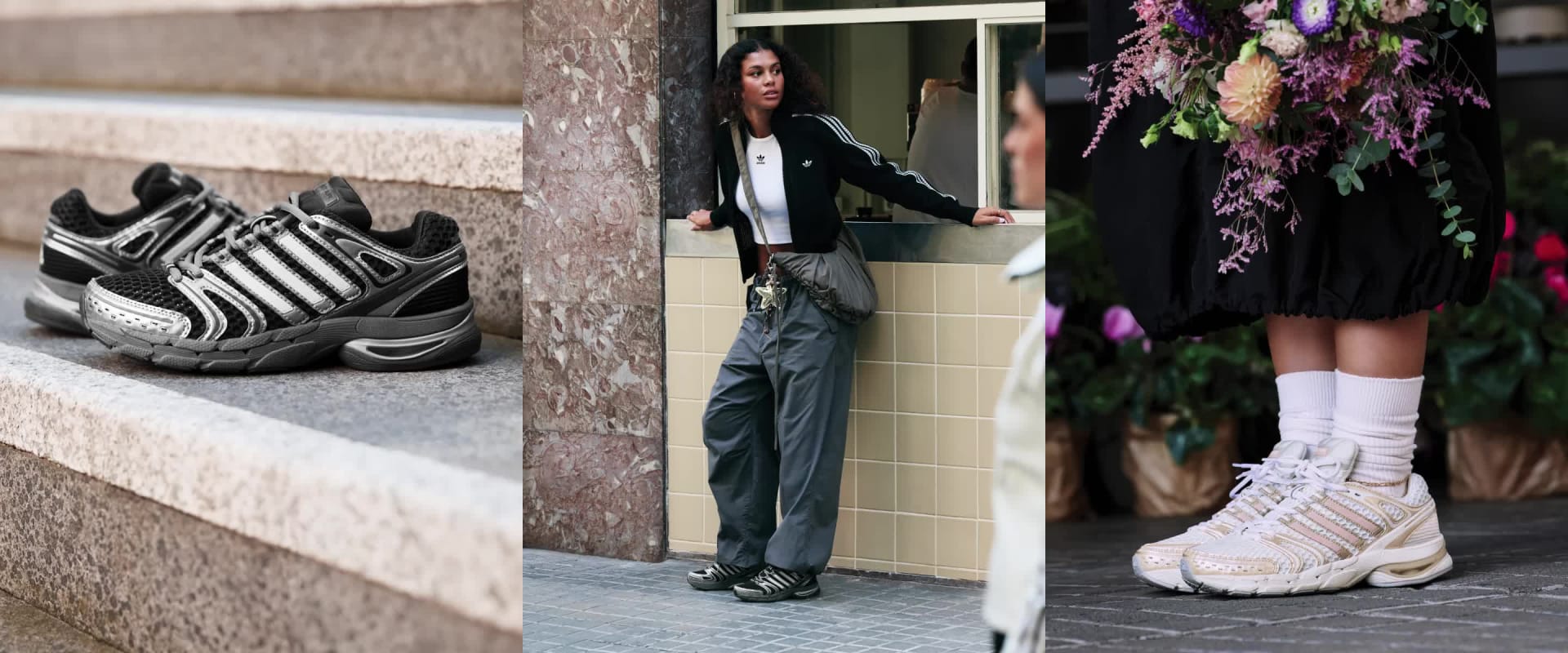 Na zdjęciu dwie osoby w całkowicie czarnych strojach, w tym płaszczach i spodniach, stoją przed budynkiem z dekoracyjnymi elementami architektonicznymi.