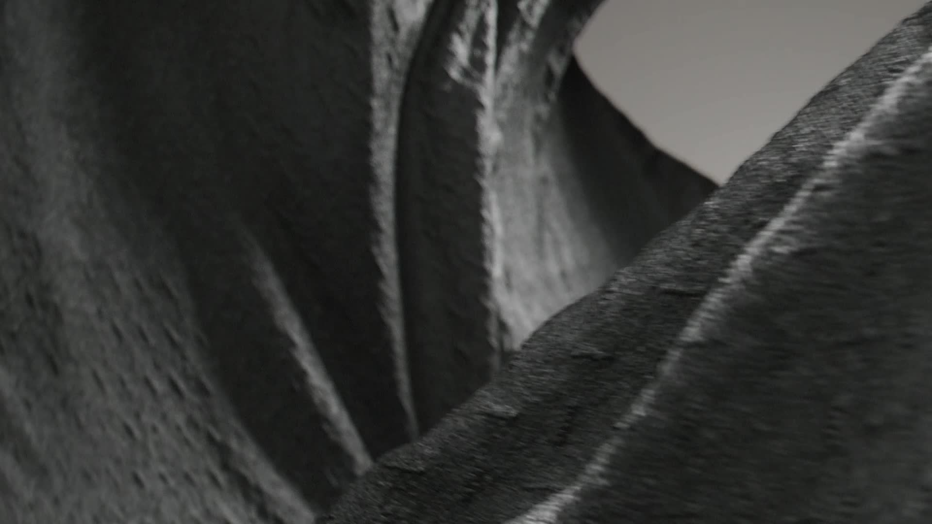 Zoomed-in moving CGI of ADISTRONG material.