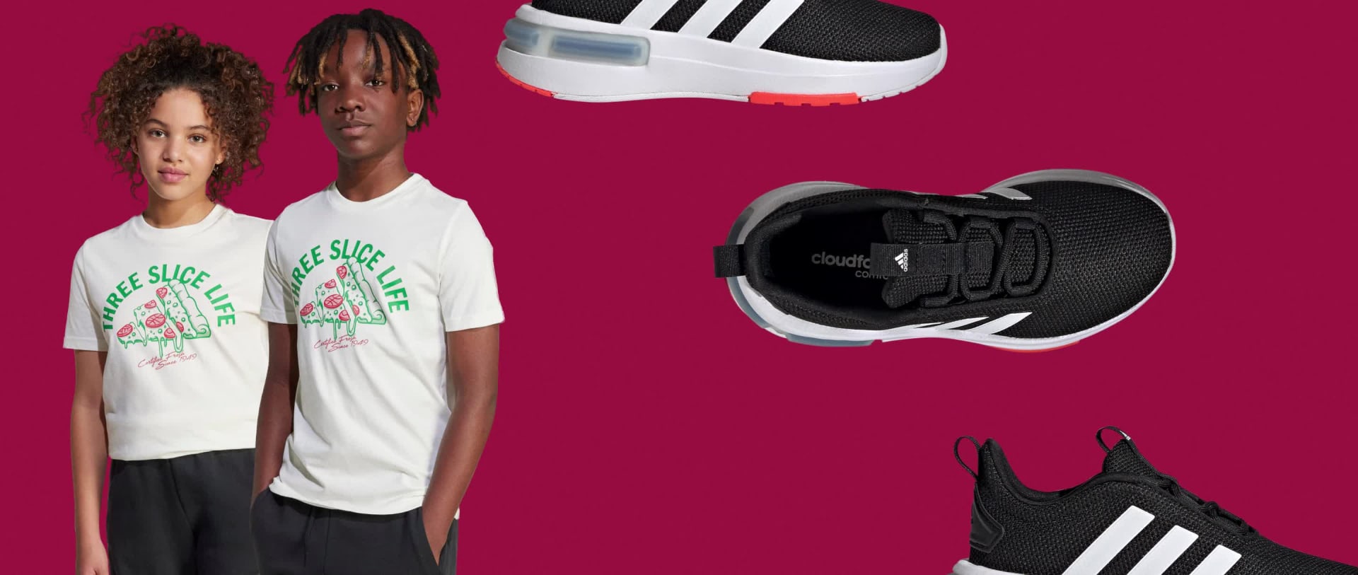 Deux personnes portant des t-shirts blancs avec un logo, debout devant un fond rouge, avec une paire de sneakers noires et blanches au premier plan.