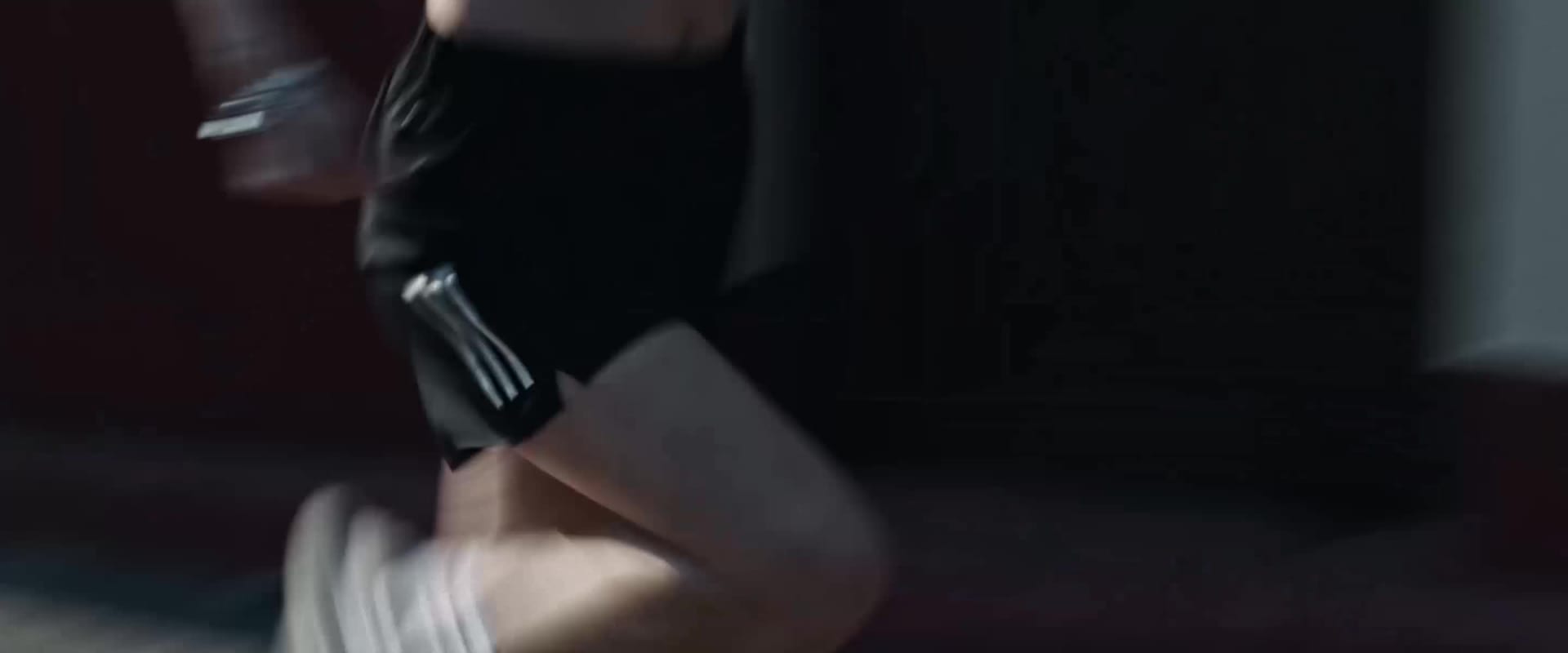 Video of a man and woman wearing Adizero Evo SL: running through the city and riding a motorbike