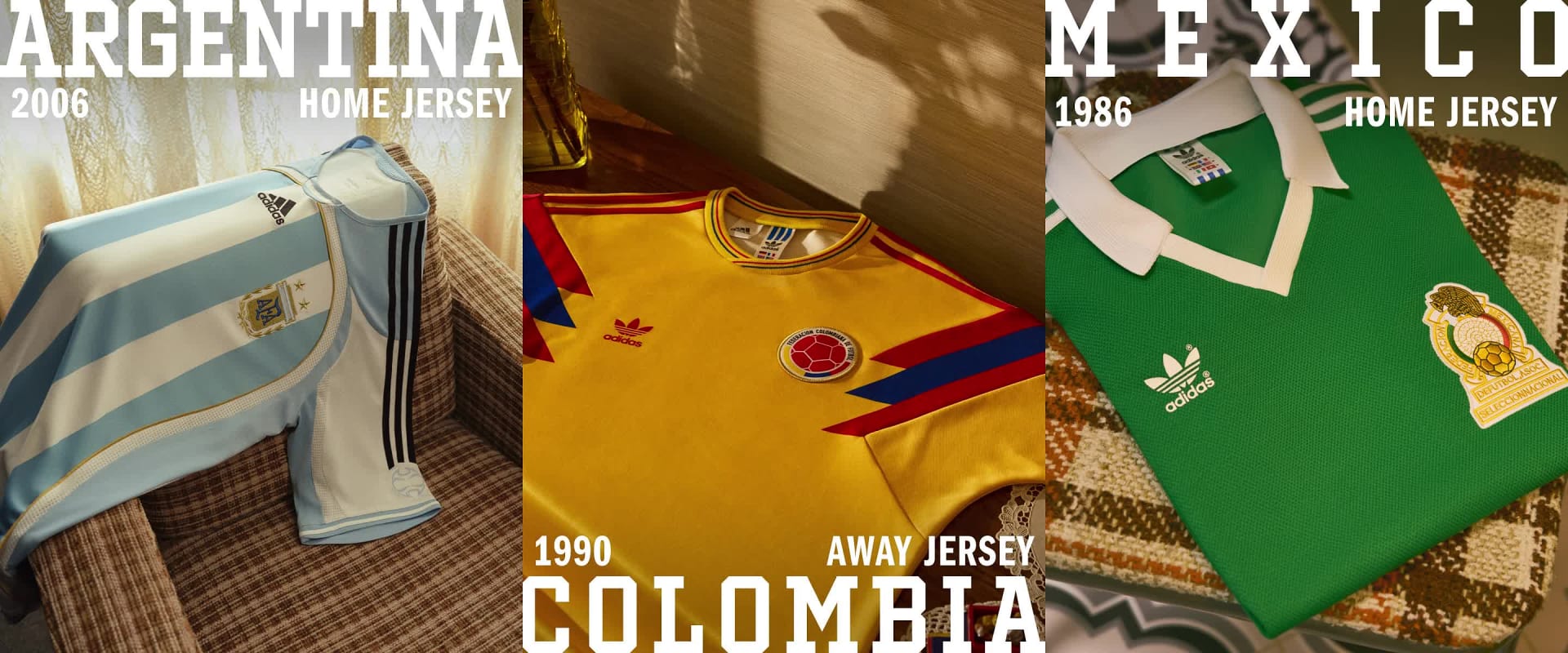 The image shows a yellow soccer jersey with the word "Colombia" printed on it, along with various logos and designs. The jersey is displayed alongside other sports-related items in what appears to be a retail or display setting.