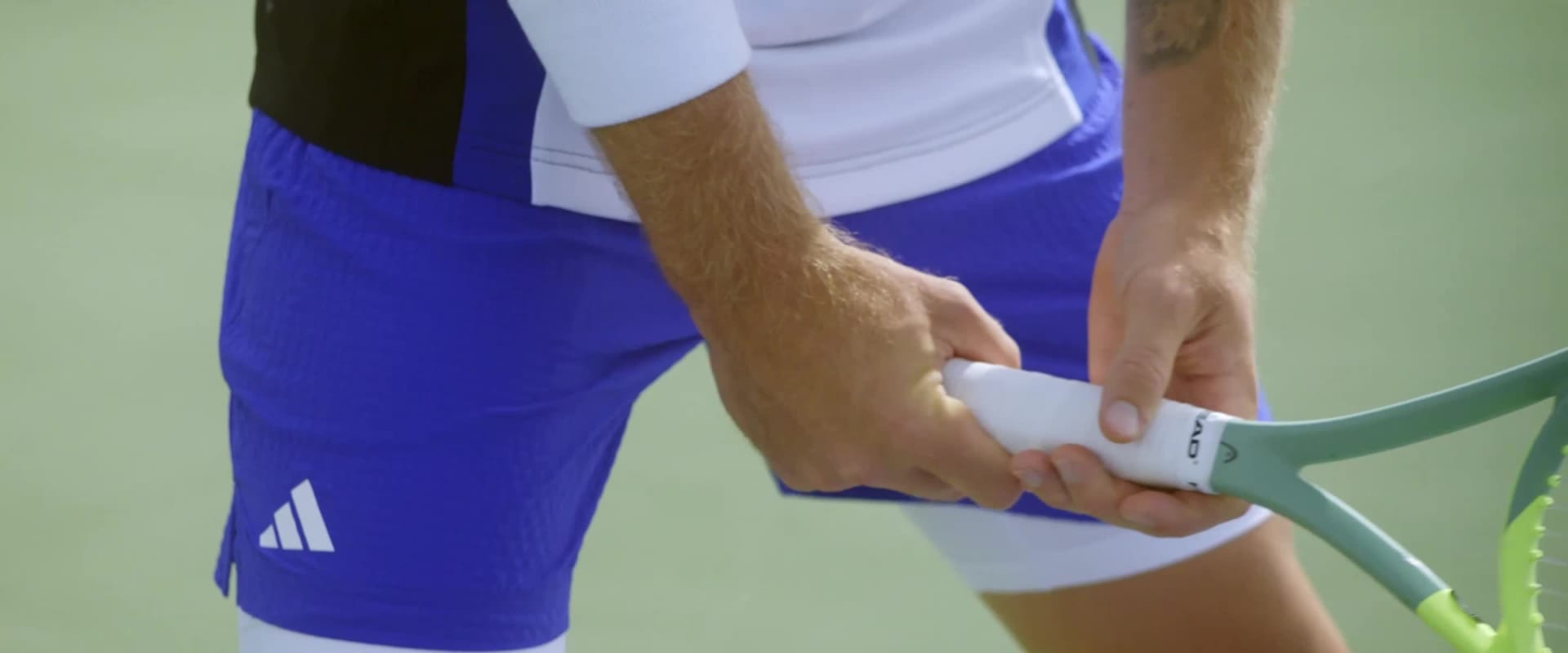 Jessica Pegula, Alejandro Fokina and Stefanos Tsitsipas wearing the New York Collection on court.