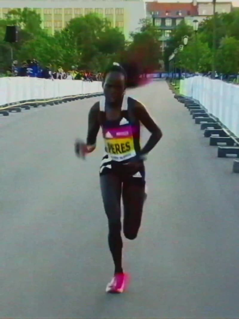 Animated images of white and black adidas running shoe, Pro 4, worn by athletes running on a road.